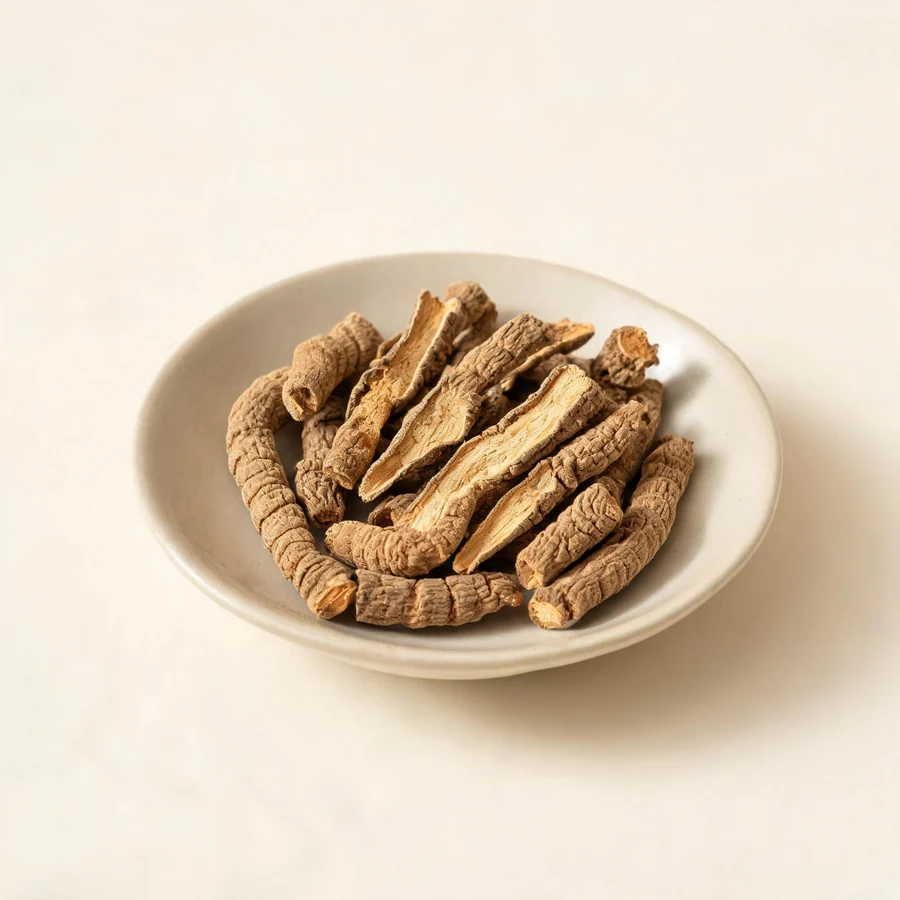 Dried Ba Ji Tian root arranged in a shallow bowl