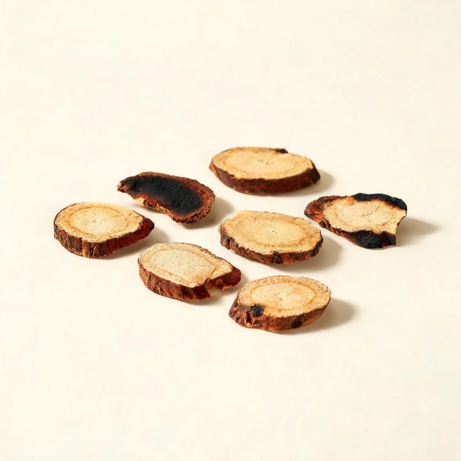 Dried Di Yu root arranged in a shallow bowl