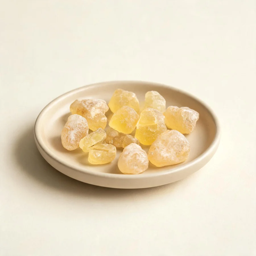 Dried Ru Xiang dried resin arranged in a shallow bowl