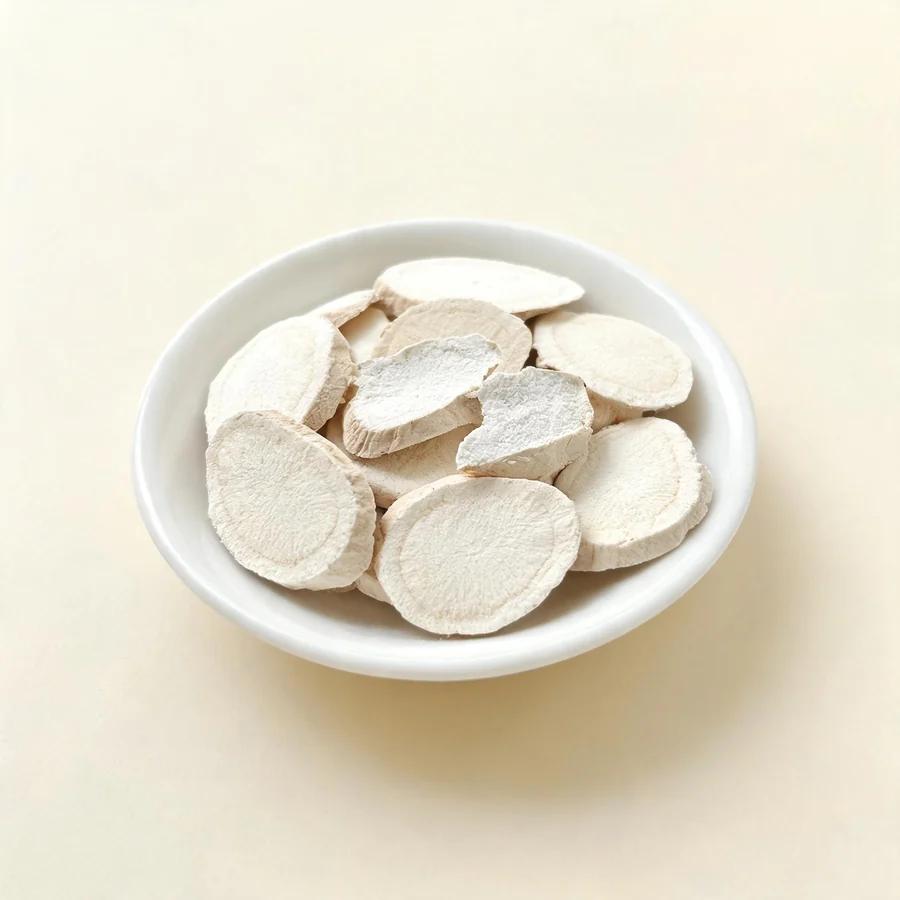 Dried Shan Yao rhizome arranged in a shallow bowl