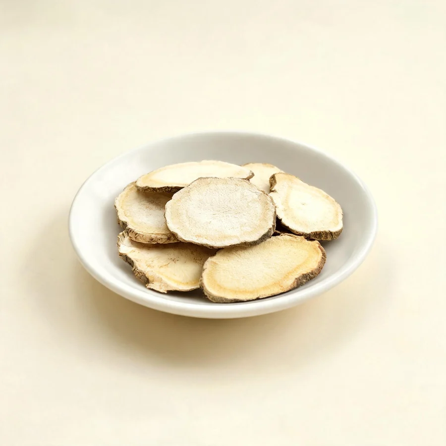 Dried Ze Xie rhizome arranged in a shallow bowl